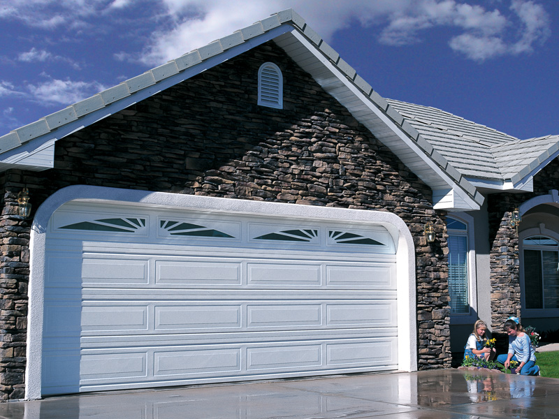 How do tilt garage doors work?